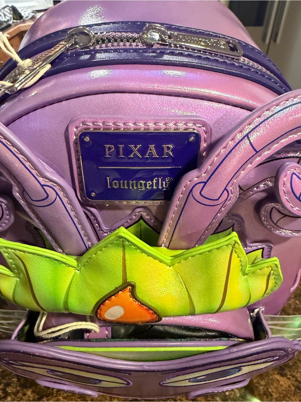 Loungefly Purple & Green Kids Character Mini Backpack with Blue Eye Details - Picture 4 of 4